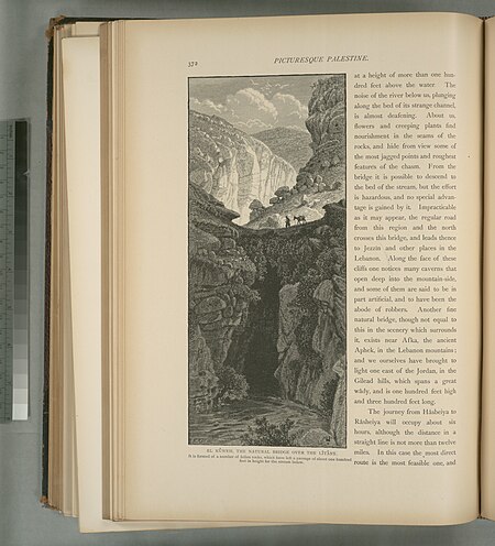 El Kûweh, the natural bridge over the Lîtâny. It is formed of a number of fallen rocks, which have left a passage of about one hundred feet in height for the stream below, 1881