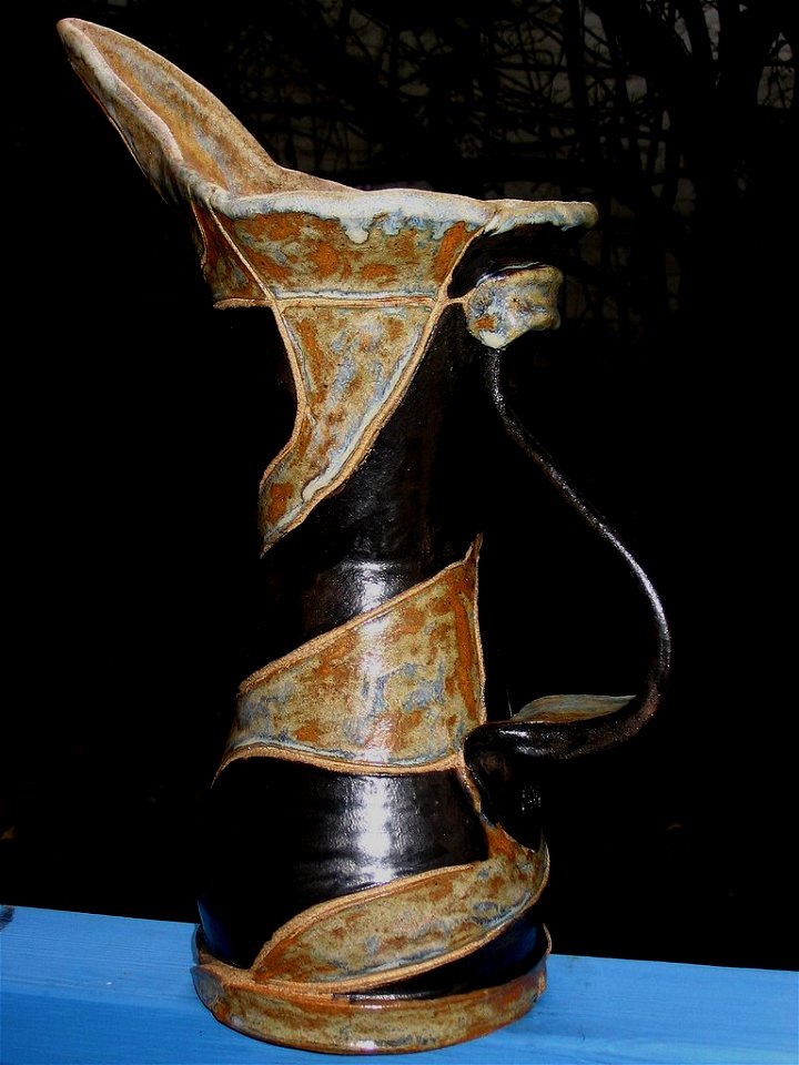 Tall ceramic pitcher