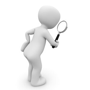 Magnifying glass cache treasure hunt. Free illustration for personal and commercial use.