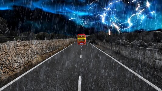 Thunderstorm double decker bus traffic. Free illustration for personal and commercial use.