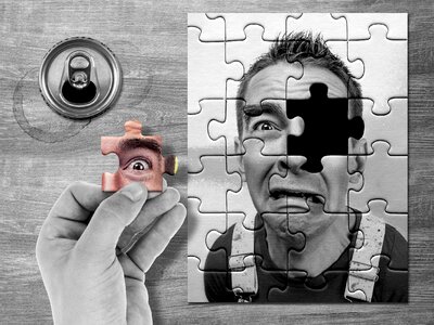 Jigsaw puzzle head gray eye. Free illustration for personal and commercial use.