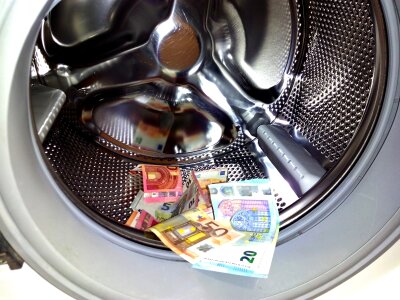 Laundry laundering corruption. Free illustration for personal and commercial use.