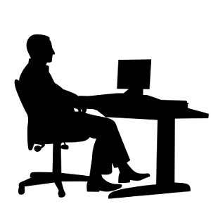 Businessman at Office Silhouette. Free illustration for personal and commercial use.