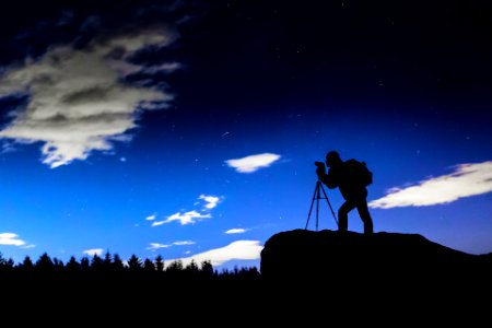 Photographer Silhouette At Night. Free illustration for personal and commercial use.