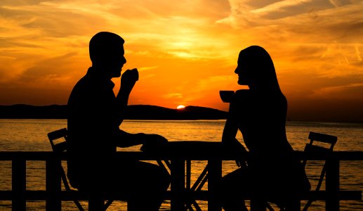 Couple Drinking Coffee at Sunset. Free illustration for personal and commercial use.