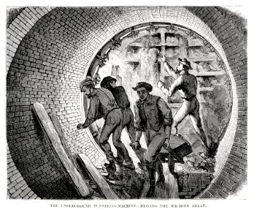 Illustration of the underground tunneling machine - driving the machine ahead from Illustrated description of the Broadway underground railway (1872) by New York Parcel Dispatch Company.. Free illustration for personal and commercial use.