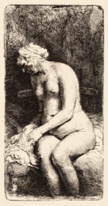Naked woman showing her breasts, vintage erotic art. Nude Seated on a Bench with a Pillow (Woman Bathing Her Feet at a Brook) (1658) by Rembrandt van Rijn. Original from The National Gallery of Art. Digitally enhanced by rawpixel.
