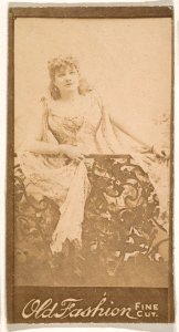 Actress standing behind iron railing, from the Actresses series (N664) promoting Old Fashion Fine Cut Tobacco MET DPB869730