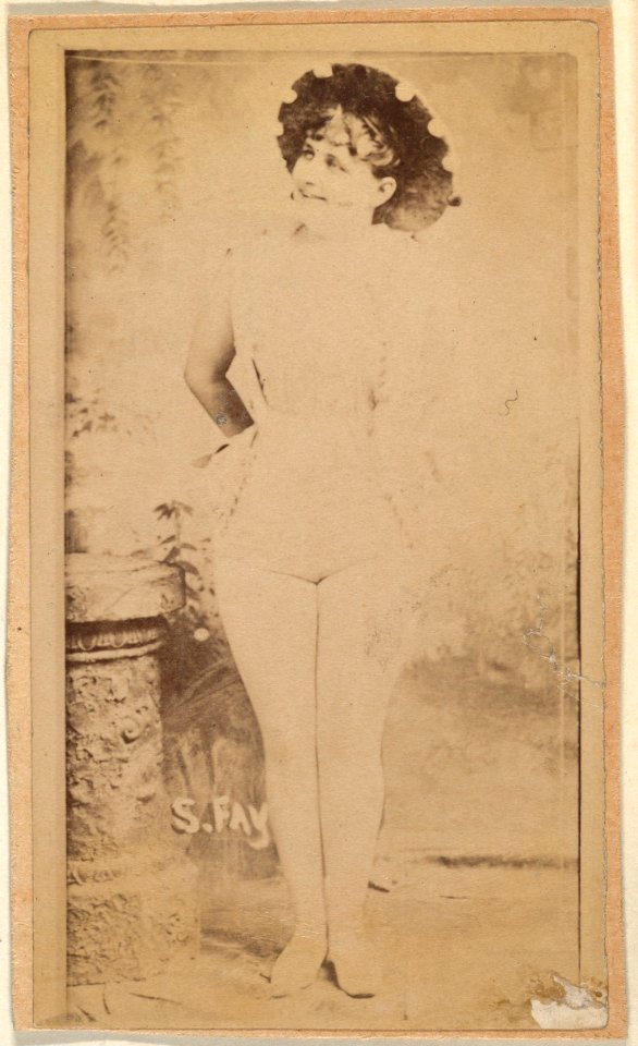 Actress wearing brimmed hat with pompoms, from the Actresses series (N668) MET DPB869852