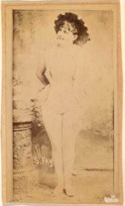 Actress wearing brimmed hat with pompoms, from the Actresses series (N668) MET DPB869852