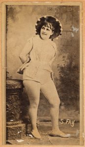 Actress wearing brimmed hat with pompoms, from the Actresses series (N668) MET DPB869849