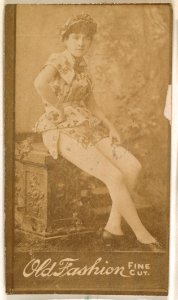 Actress seated on bench, from the Actresses series (N664) promoting Old Fashion Fine Cut Tobacco MET DPB869688