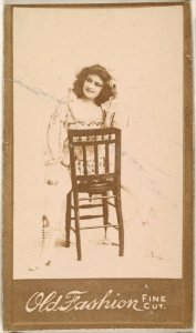 Actress straddling chair, from the Actresses series (N664) promoting Old Fashion Fine Cut Tobacco MET DPB869802
