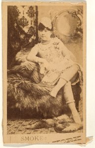 Actress lounging on fur throw, from the series Actresses (N674), promoting New York Dandies MET DPB870011