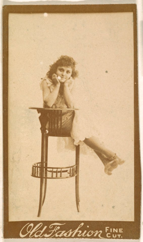 Actress posing on back of tall chair, from the Actresses series (N664) promoting Old Fashion Fine Cut Tobacco MET DPB869682