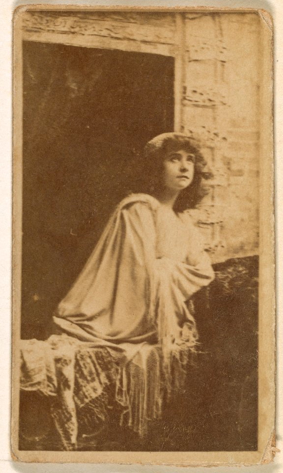 Actress posed in open window, from the Actresses series (N245) issued by Kinney Brothers to promote Sweet Caporal Cigarettes MET DP859948