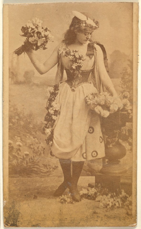 Actress holding bouquet of flowers, from the Actresses series (N668) MET DPB869976