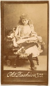 Actress gazing down at lap, from the Actresses series (N664) promoting Old Fashion Fine Cut Tobacco MET DPB869798