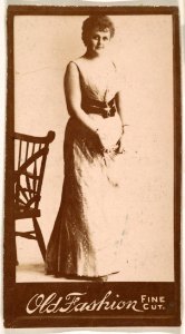 Actress standing next to chair, from the Actresses series (N664) promoting Old Fashion Fine Cut Tobacco MET DPB869729