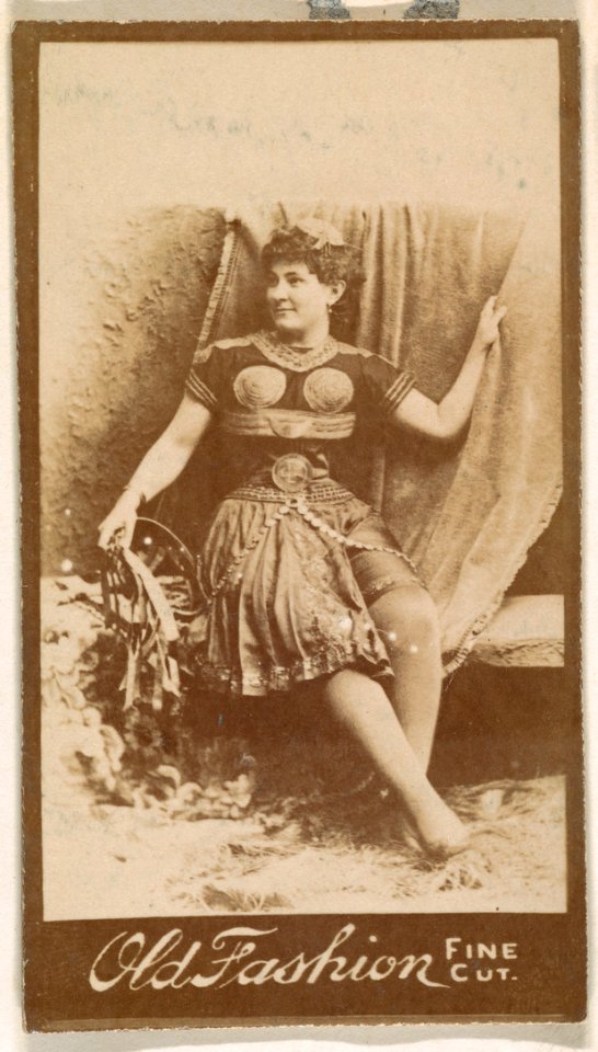 Actress holding studio curtain, from the Actresses series (N664) promoting Old Fashion Fine Cut Tobacco MET DPB869677