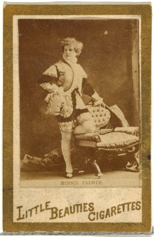 Minnie Palmer (standing beside chair), from the Actresses and Celebrities series (N60, Type 1) promoting Little Beauties Cigarettes for Allen & Ginter brand tobacco products MET DP839442