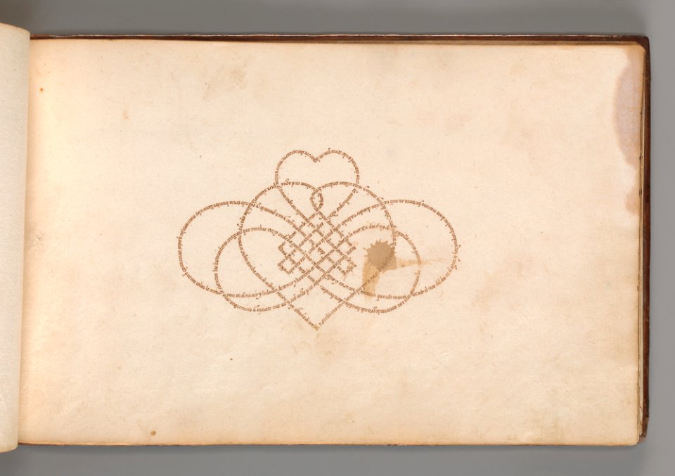 Micrographic Design in the Shape of a Lovers Knot MET DP-12235-035