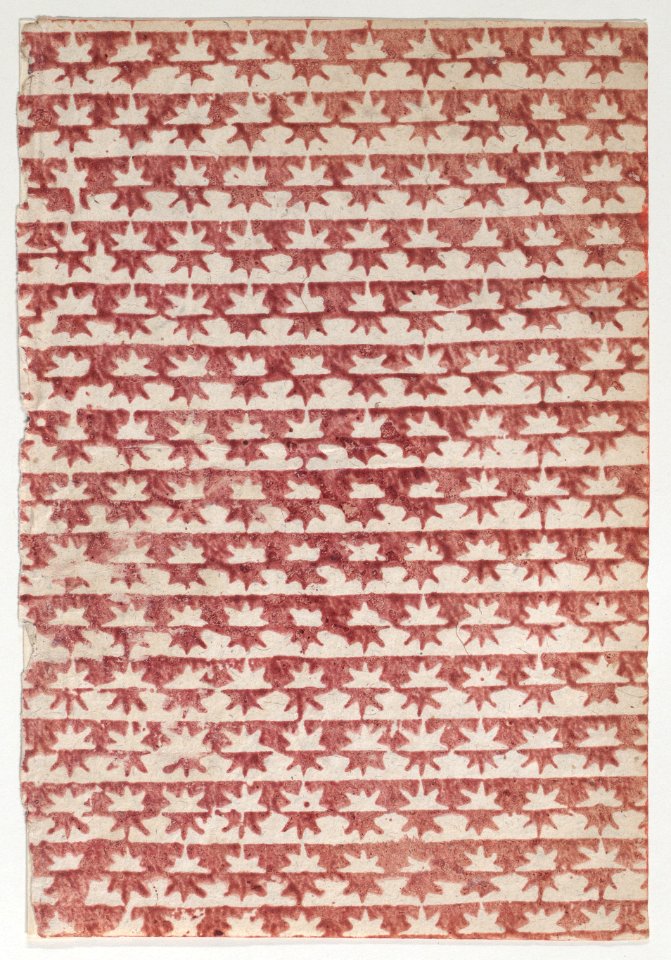 Sheet with overall red star pattern Met DP887068