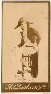 Seated actress wearing military-inspired costume, from the Actresses series (N664) promoting Old Fashion Fine Cut Tobacco MET DPB869673