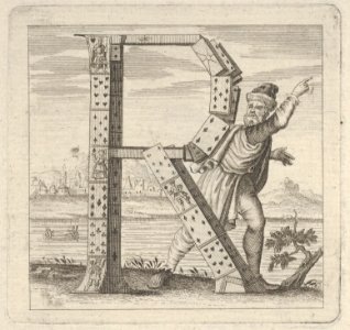 The letter R, constructed from a court pack of playing cards, stands on a riva (river bank) MET DP855599