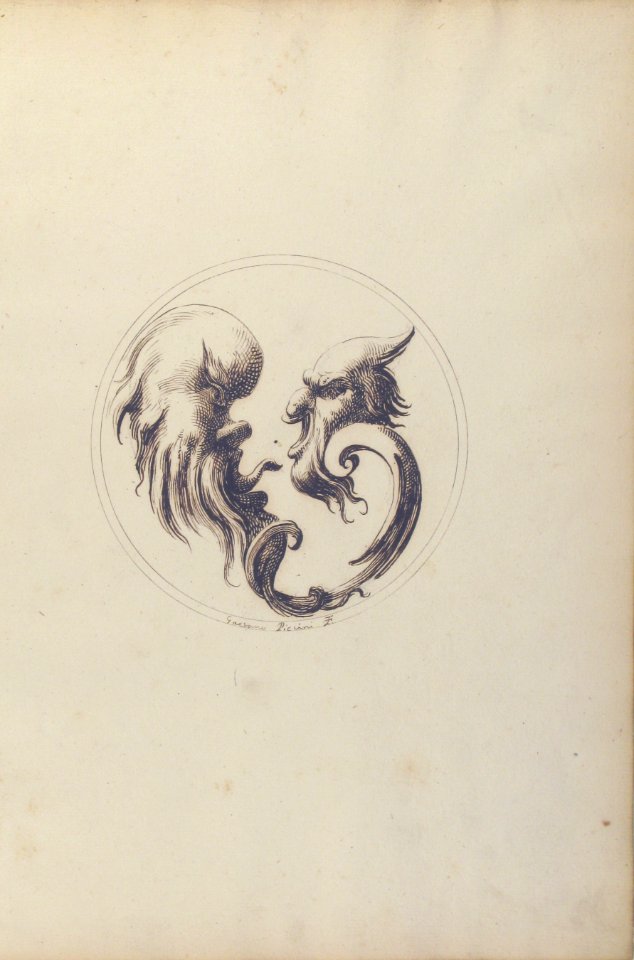 Two Grotesque Heads Facing One Another within a Circle MET 60.541.5