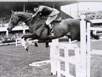 Nils T. during a horse-back jumping competition on the 4th…