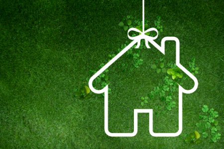 Paper house on green grass background. Free illustration for personal and commercial use.