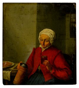 A woman holding a jug and a cup 
