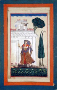 A woman standing before a pavilion (6125055104)