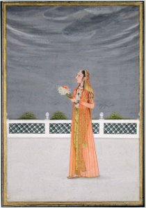 A woman on a terrace, holding a bunch of narcissus (6124537439)