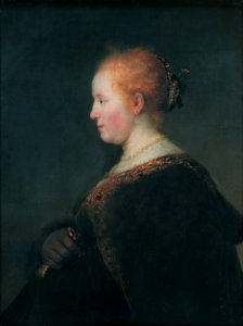 A Young Woman in Profile, with a Fan, by Rembrandt
