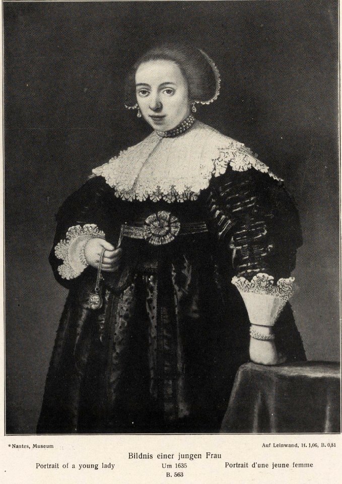 After Rembrandt - A Young Lady holding a Watch and a Chain in her Right Hand