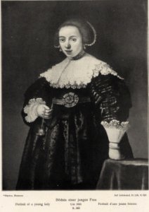 After Rembrandt - A Young Lady holding a Watch and a Chain in her Right Hand