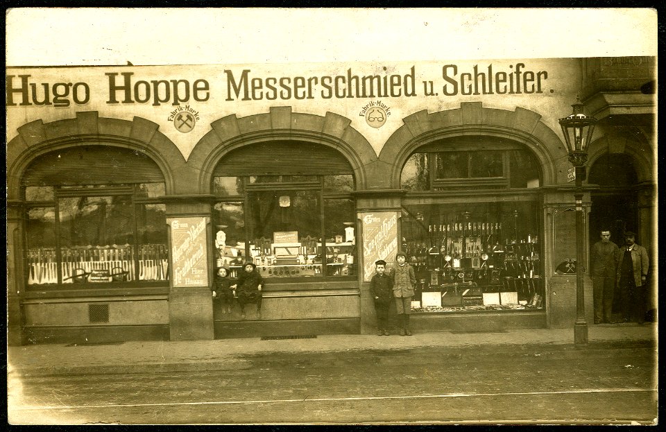 AK Hugo Hoppe Hannover, Messerschmied Schleifer, Bildseite Ladengeschäft Herschelstraße 17, Fabrik-Marke Reparaturbetrieb Kraftbetrieb Erstes Spezialhaus für Solinger Stahlwaren Haltestelle Strassenbahn