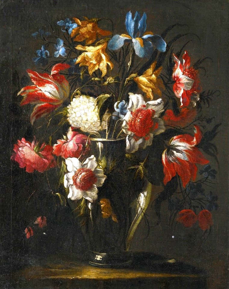'Blue Irises, Parrot Tulips, Anemones, Peonies and Other Flowers in a Glass Vase, on a Stone Ledge' by Juan de Arellano