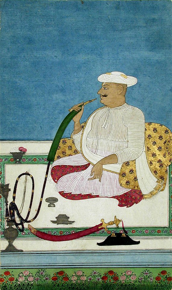 A Hindu raja seated smoking a hookah (6124550883)