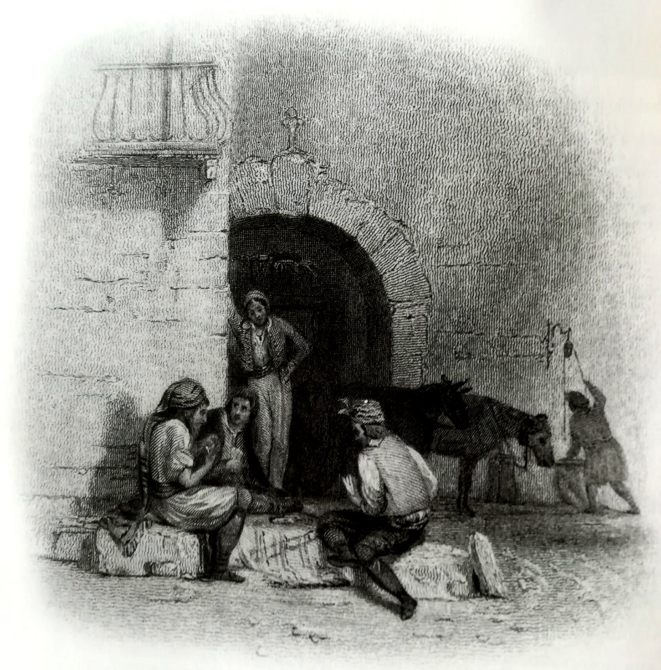 A la puerta de la posada