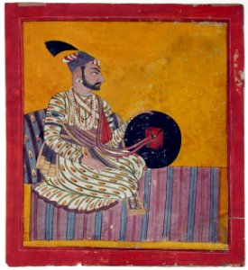 A nobleman seated on a striped rug (6125122984). Free illustration for personal and commercial use.