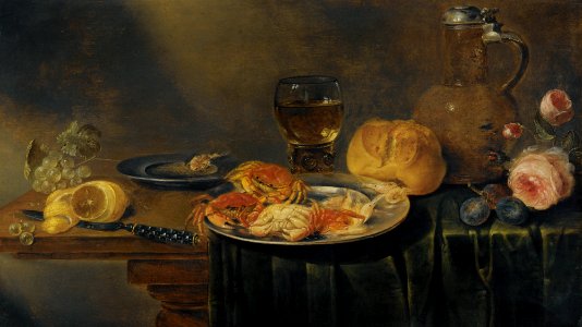 A Still Life with Roses, a Jug, a Loaf of Bread, a Filled Wine Glass, Two Plates with Prawns and Crabs, a Knife, a Partly-Peeled Lemon and Grapes over a Partly-Draped Table