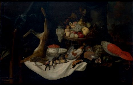 Pieter van Overschie - Still life with a are, fruit basket and game with a parrot, a bowl of strawberries and a nautilus on a table