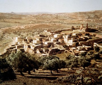 AN ARAB VILLAGE NEAR JERUSALEM AND BEYOND IT, THE JUDEAN DESERT, PHOTOGRAPHED BY IN THE LATE 19TH CENTURY BY FRENCH PHOTOGRAPHER, BONFILS. צילום צבע מסוף המאה ה19 של הצלם הצרפ