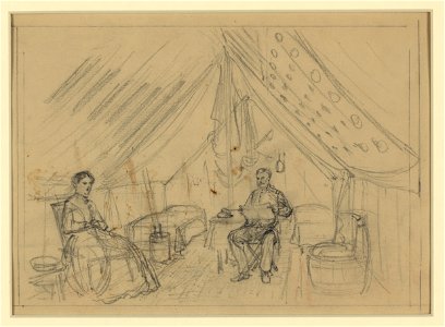 An officer and a woman sitting in a tent LCCN2004660912