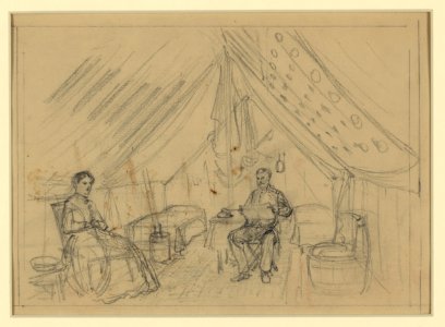An officer and a woman sitting in a tent LCCN2004660912
