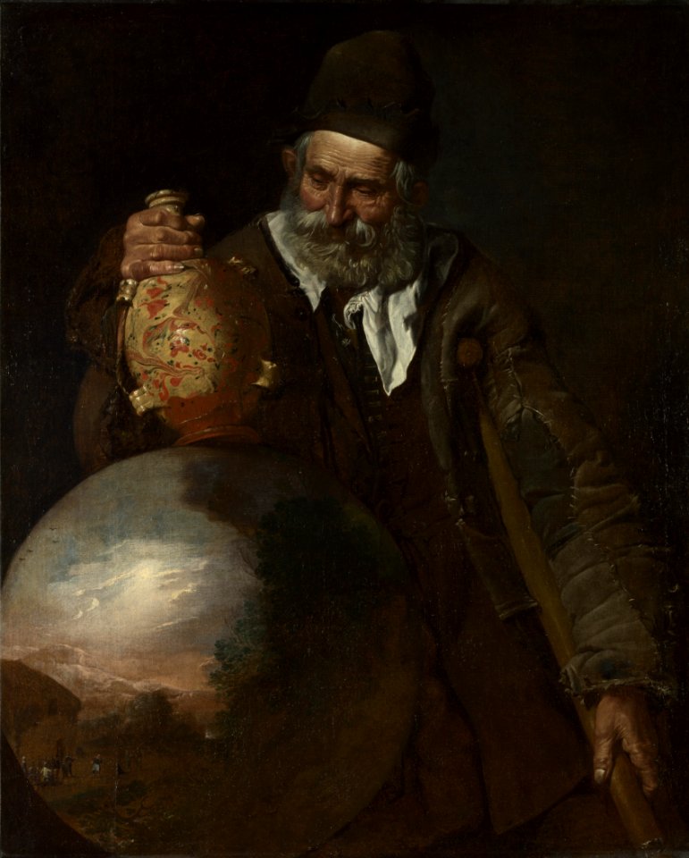 An old man holding a pilgrim-bottle