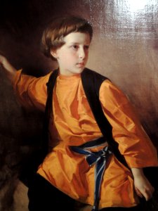 Boy in orange shirt by I.Makarov (1890s) detail. Free illustration for personal and commercial use.